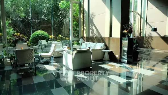 Luxurious modern living room with floor-to-ceiling windows and garden view