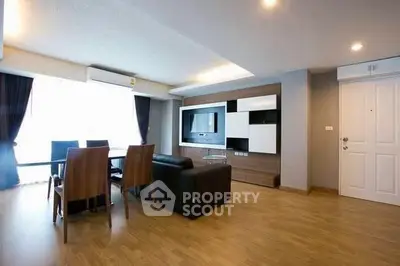 Spacious modern living room with elegant dining area and stylish decor