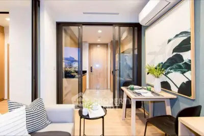 Modern living room with stylish decor and air conditioning in a contemporary apartment.