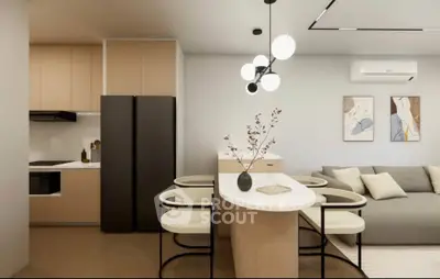 Modern open-plan living room with sleek kitchen and stylish dining area