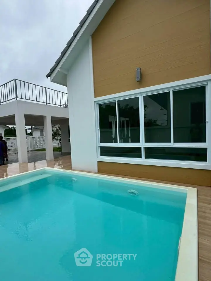 Modern house with private pool and spacious patio, perfect for luxury living.