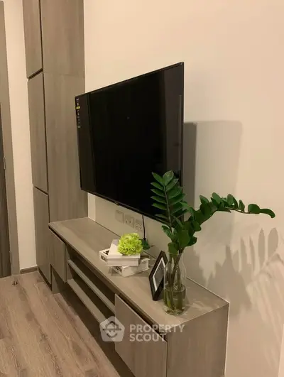 Modern living room with sleek TV unit and stylish decor