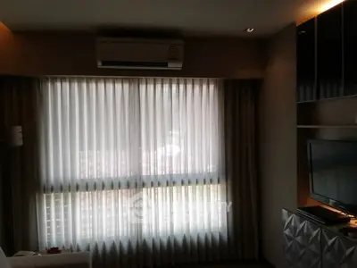 Cozy living room with air conditioning and modern decor