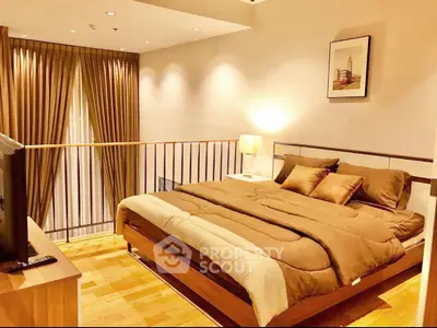 Luxurious bedroom with elegant decor and warm lighting in modern apartment