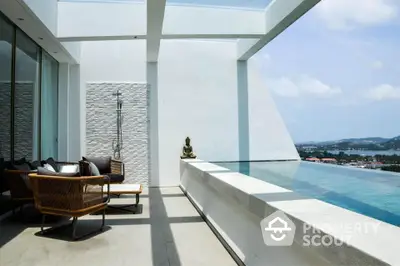 Luxurious rooftop terrace with infinity pool and stunning panoramic views