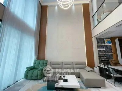 Luxurious modern living room with high ceilings and elegant decor