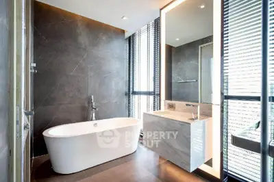 Luxurious bathroom with freestanding bathtub and modern design