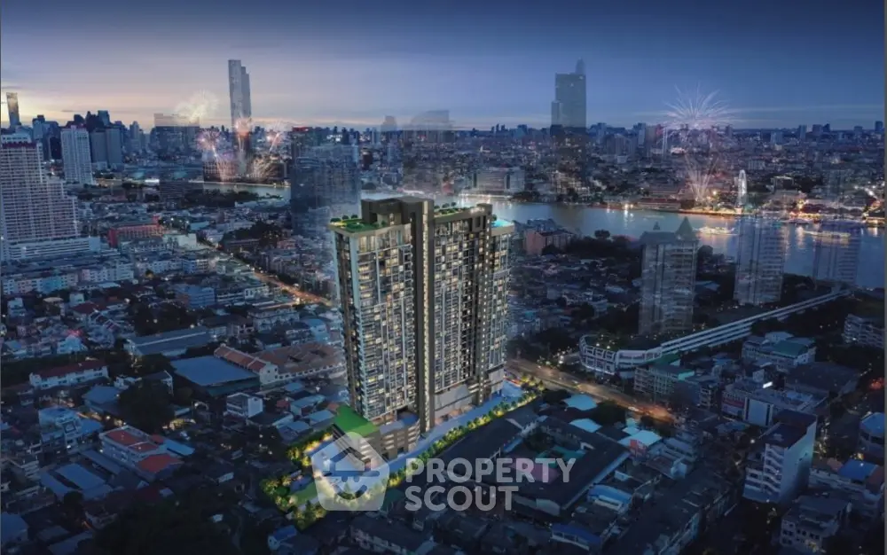 Stunning aerial view of modern high-rise building in vibrant cityscape at night with fireworks.