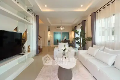 Luxurious modern living room with elegant decor and ample natural light
