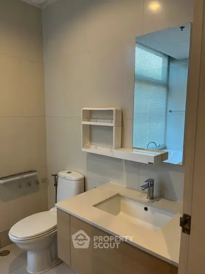 Modern bathroom with sleek fixtures and natural light