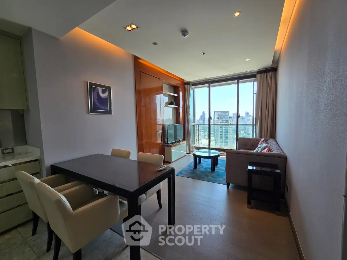 Modern living room with city view, stylish furniture, and ambient lighting