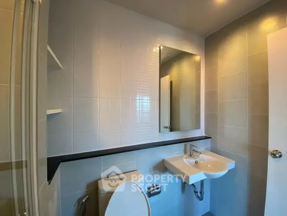 Modern bathroom with sleek fixtures and minimalist design