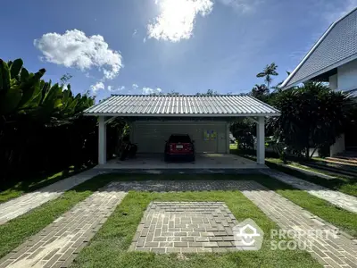 Charming residential carport with lush greenery and modern design