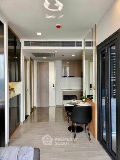 Modern apartment interior with open layout and stylish dining area