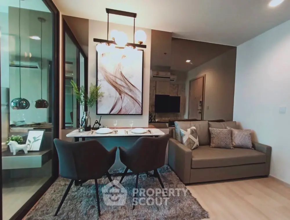 Modern living room with stylish decor, cozy seating, and elegant dining area, perfect for entertaining guests.