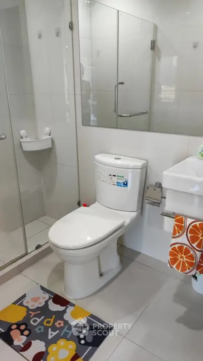 Modern bathroom with glass shower and stylish decor