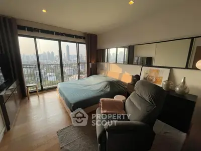 Spacious bedroom with stunning city view and modern decor
