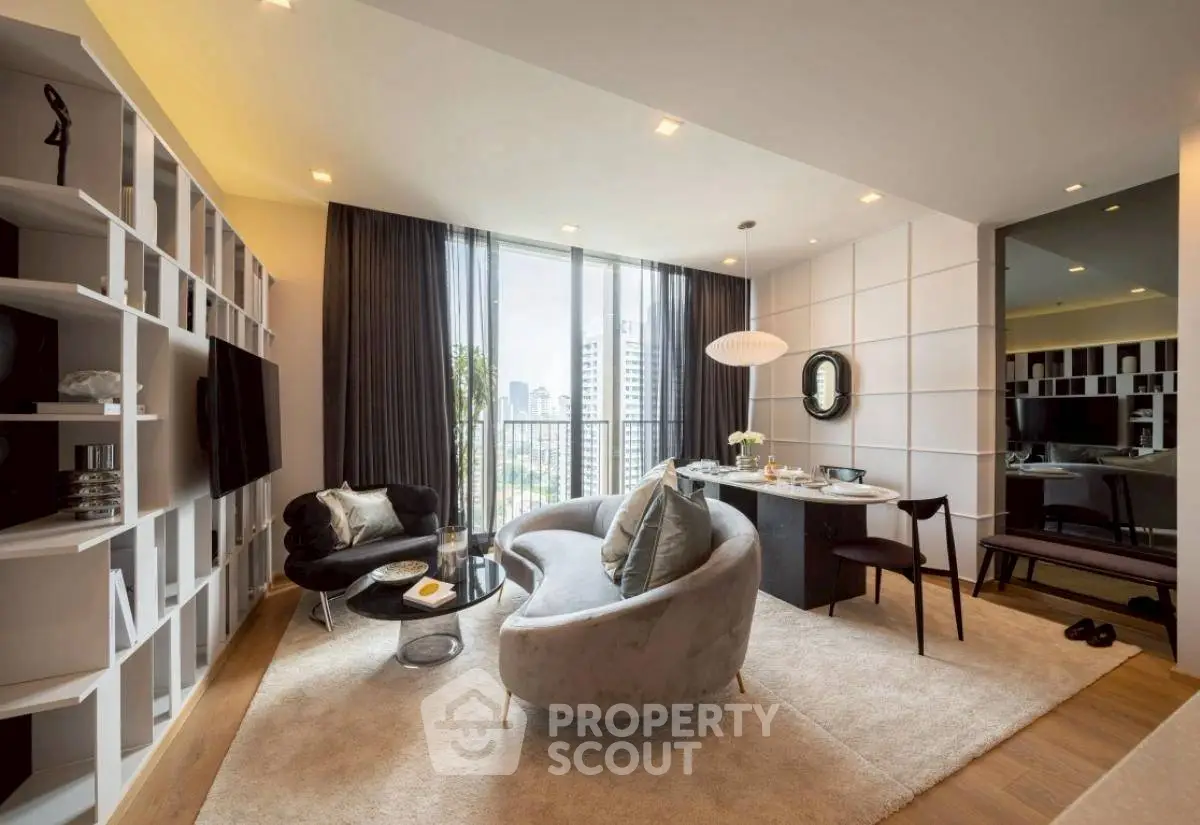 Luxurious modern living room with elegant furniture and city view, perfect for urban living.