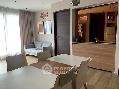 Modern dining area with stylish decor and open kitchen layout