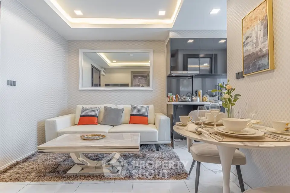 Modern living room with elegant decor and dining area in open layout