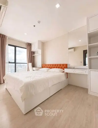 Spacious modern bedroom with city view and elegant furnishings