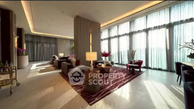 Luxurious living room with floor-to-ceiling windows and elegant decor