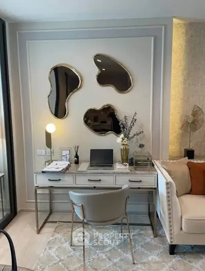 Stylish home office with modern decor and elegant mirrors, perfect for productivity and comfort.