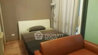 Cozy bedroom with modern decor and comfortable furnishings