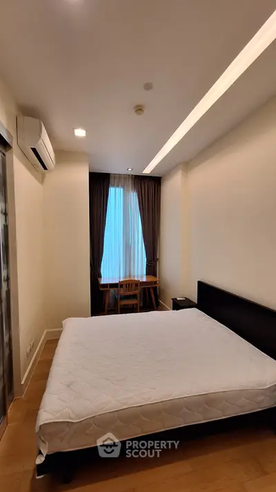 Modern bedroom with minimalist design and natural light