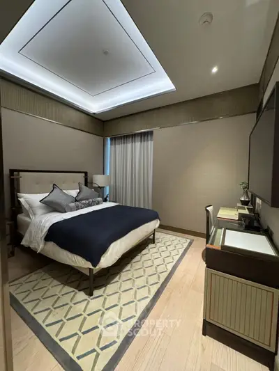 Luxurious bedroom with modern decor and elegant lighting