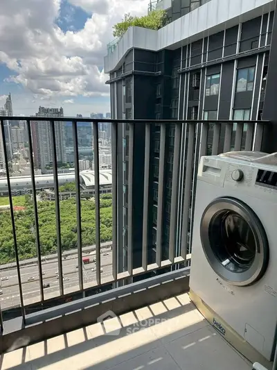 High-rise balcony with washing machine and stunning city view