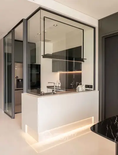 Modern kitchen with sleek design and ambient lighting