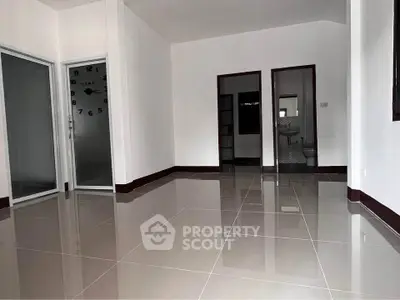 Spacious modern interior with glossy tiled floors and minimalist design, perfect for customization.