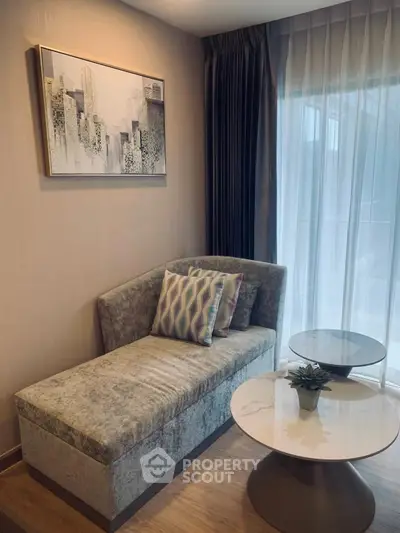 Stylish living room corner with modern chaise lounge and elegant decor