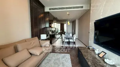 Luxurious modern living room with elegant decor and open kitchen layout