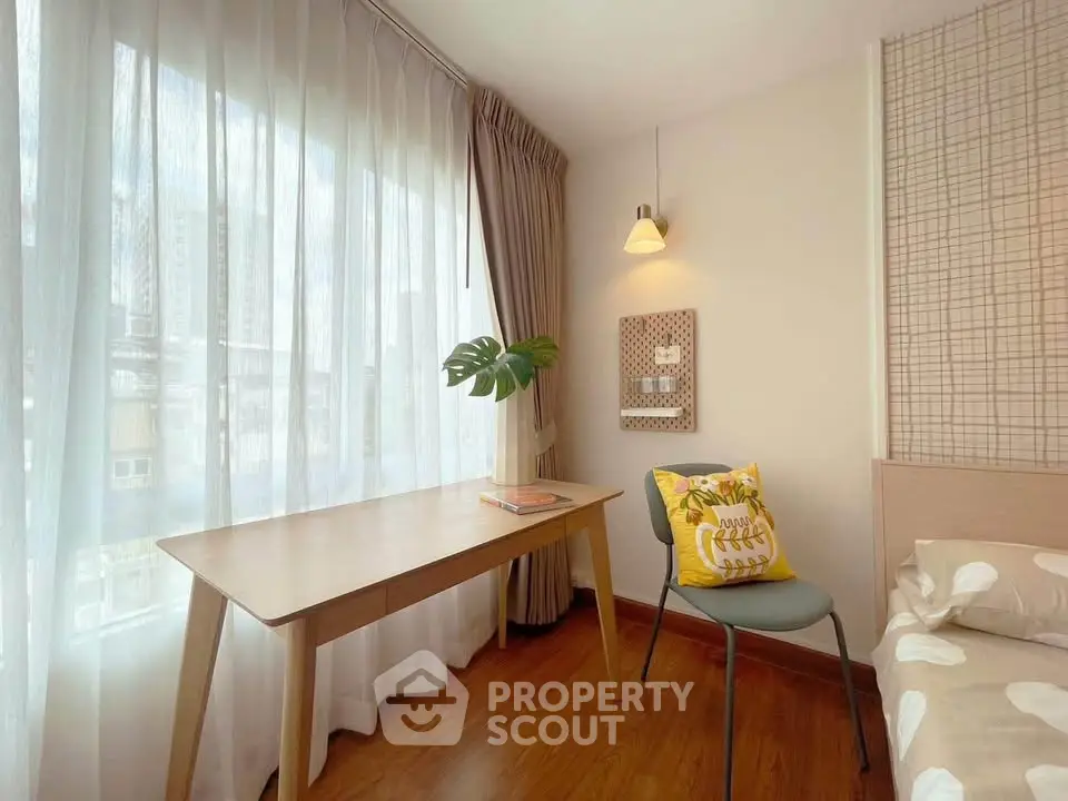 Bright and cozy study area with natural light and modern decor