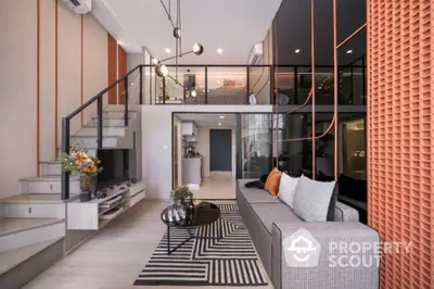 Modern duplex living room with stylish decor and mezzanine level