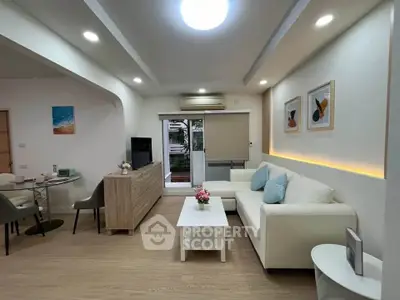 Modern living room with stylish decor and cozy seating area