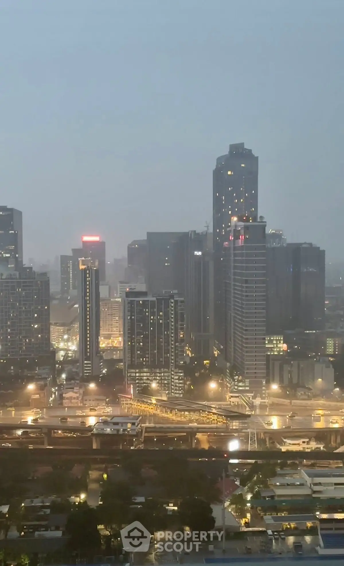 Stunning cityscape view showcasing modern skyscrapers and urban skyline at dusk.