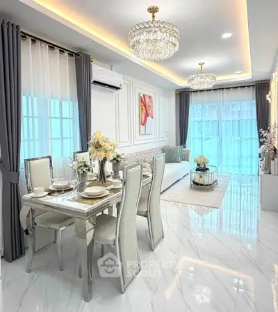 Luxurious modern living room with elegant dining area, featuring chandeliers and stylish decor.