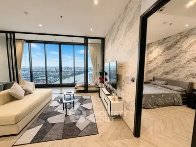 Luxurious living room with stunning river view and elegant bedroom