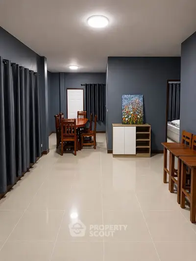 Spacious modern living room with elegant dining area and stylish decor
