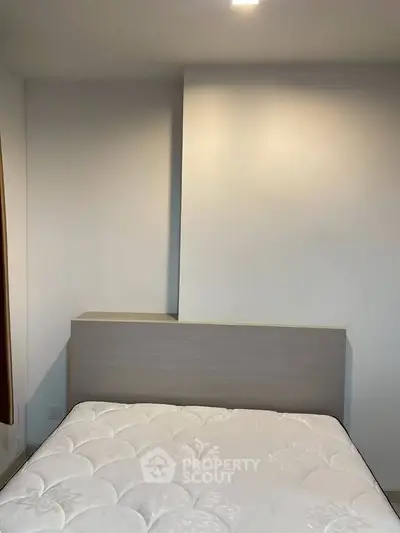 Minimalist bedroom with modern design and comfortable mattress