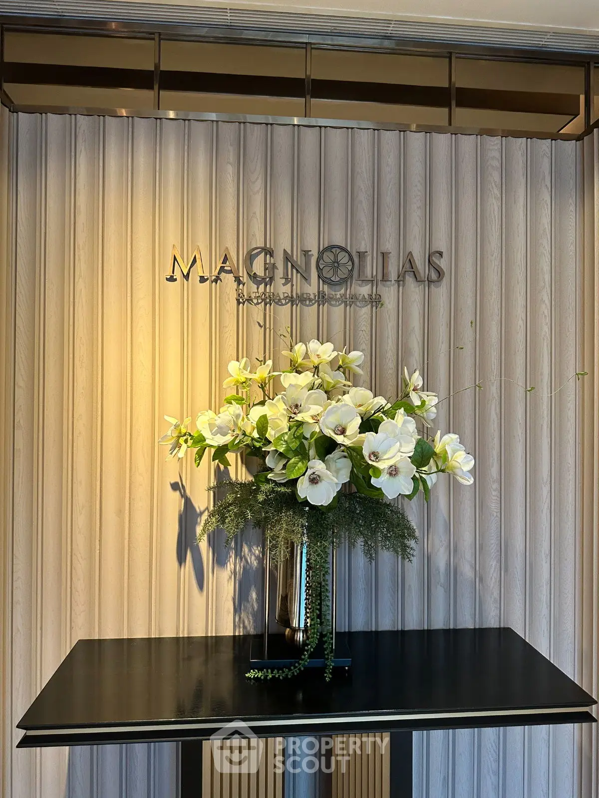 Elegant entrance with floral arrangement and stylish decor