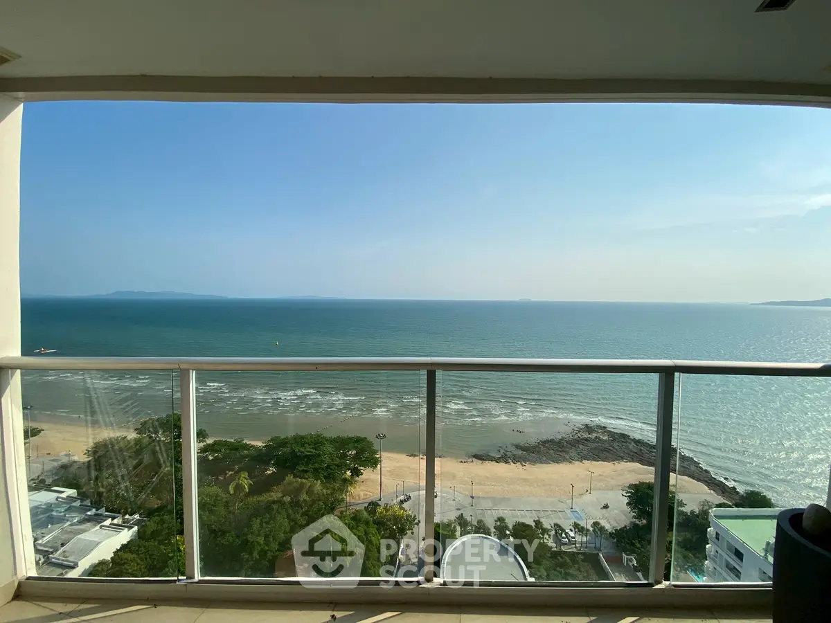 Stunning ocean view from high-rise balcony, perfect for seaside living.