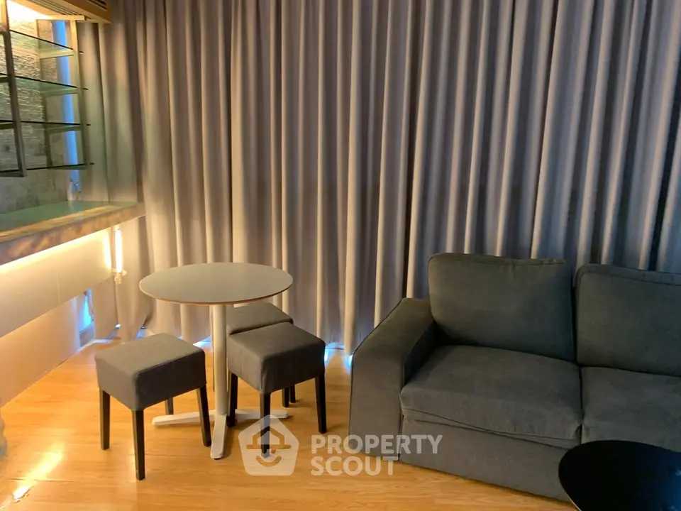 Modern living room with cozy sofa and stylish decor