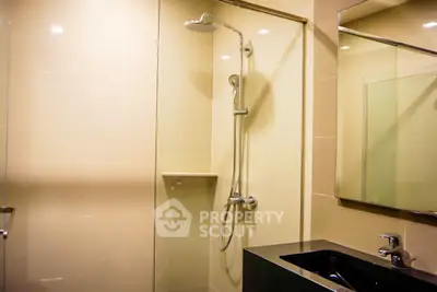 Modern bathroom with sleek shower and elegant sink design