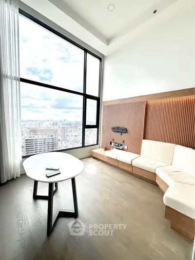 Luxurious high-rise living room with stunning city view and modern decor