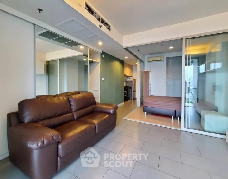 Modern studio apartment with open layout and stylish furnishings