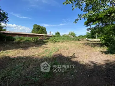 Spacious vacant land with lush greenery, perfect for development or investment opportunities.